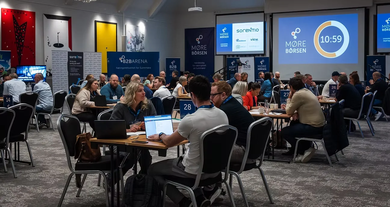 Deltakere samlet rundt bord under Mørebørsen, fra arbeidet for B2B Arena.
